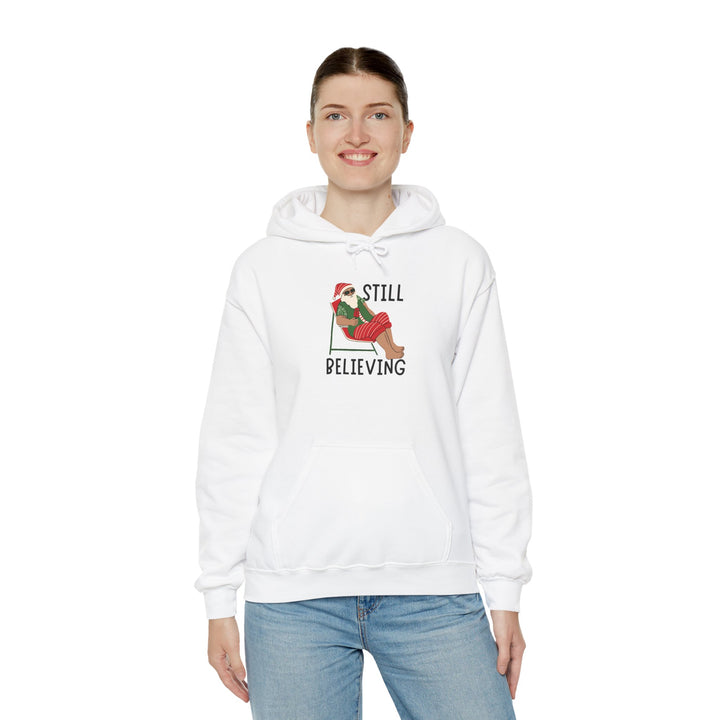 Still Believing Christmas Hoodie - Unisex Heavy Blend Sweatshirt