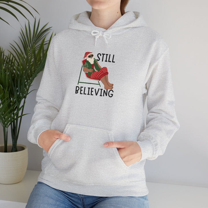 Still Believing Christmas Hoodie - Unisex Heavy Blend Sweatshirt