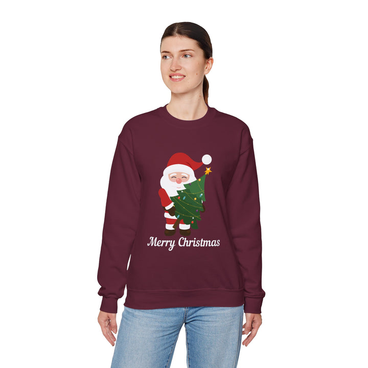 Christmas Sweatshirt – Cute Santa Hugging Christmas Tree “Merry Christmas” Holiday Crewneck
